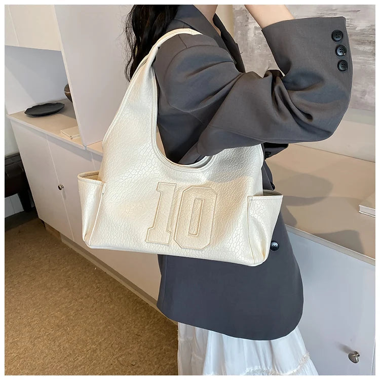 Luxury Women Bag 2025 New Armpit Handbags Women Shoulder Hobos Purse Top-Handle Bag Punk Cool Girls Shopping Packs Large Bolsas Master Coach HQ