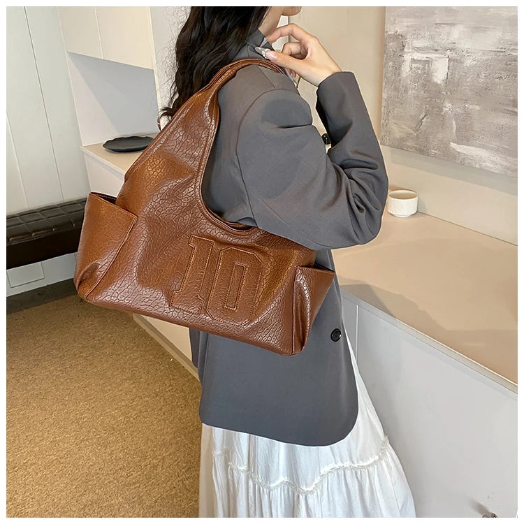 Luxury Women Bag 2025 New Armpit Handbags Women Shoulder Hobos Purse Top-Handle Bag Punk Cool Girls Shopping Packs Large Bolsas Master Coach HQ