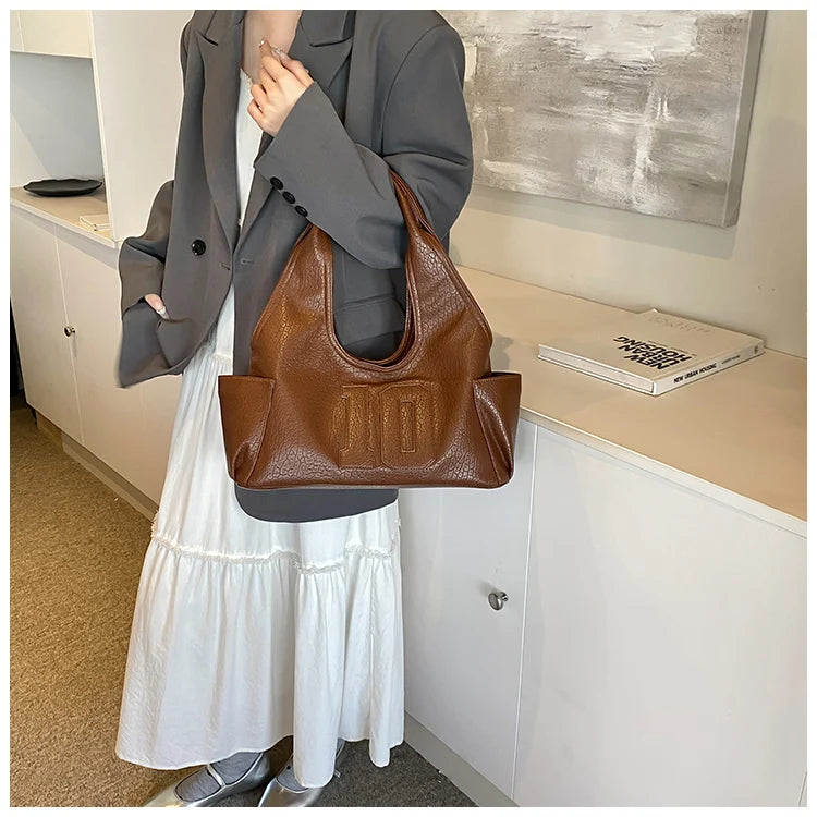 Luxury Women Bag 2025 New Armpit Handbags Women Shoulder Hobos Purse Top-Handle Bag Punk Cool Girls Shopping Packs Large Bolsas Master Coach HQ