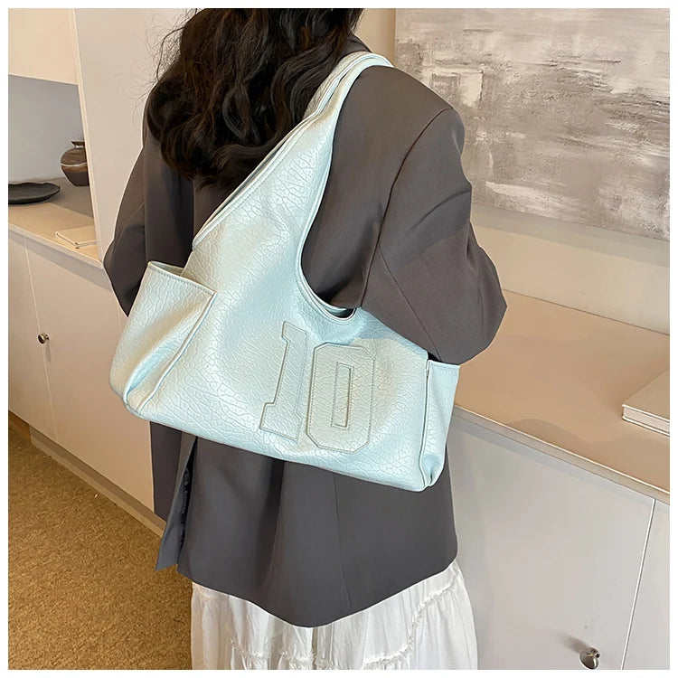 Luxury Women Bag 2025 New Armpit Handbags Women Shoulder Hobos Purse Top-Handle Bag Punk Cool Girls Shopping Packs Large Bolsas Master Coach HQ