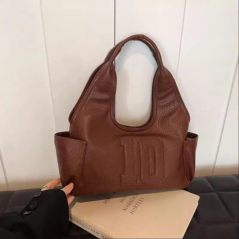 Luxury Women Bag 2025 New Armpit Handbags Women Shoulder Hobos Purse Top-Handle Bag Punk Cool Girls Shopping Packs Large Bolsas Master Coach HQ