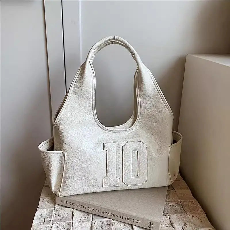 Luxury Women Bag 2025 New Armpit Handbags Women Shoulder Hobos Purse Top-Handle Bag Punk Cool Girls Shopping Packs Large Bolsas Master Coach HQ